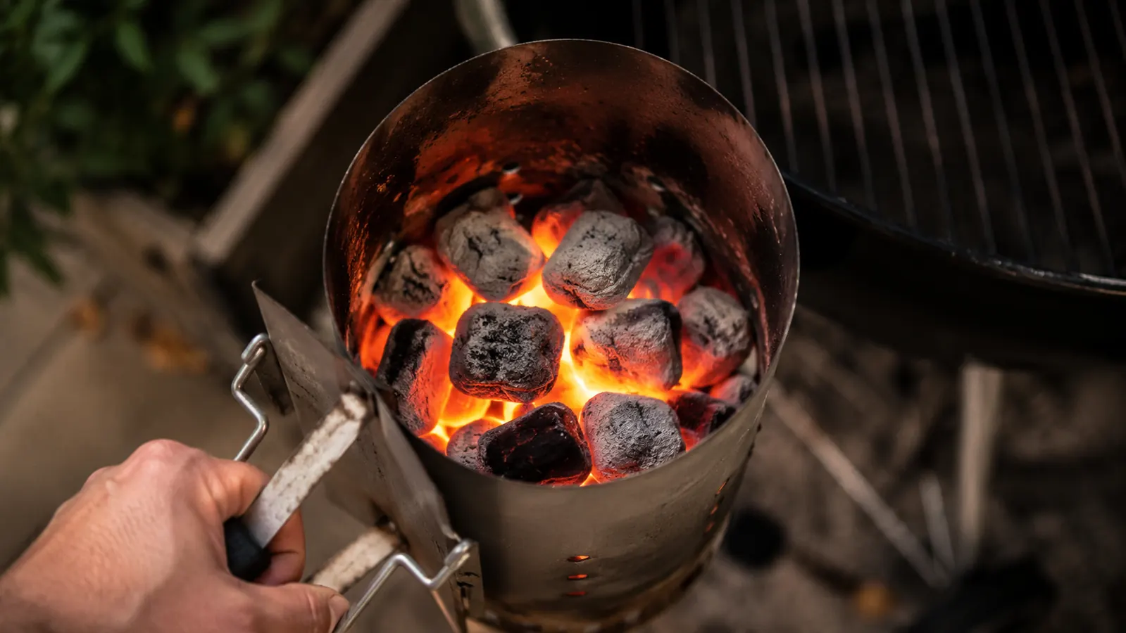 Side-by-side comparison showing the Weber Rapidfire Compact chimney next to a full-size chimney starter, demonstrating the size difference